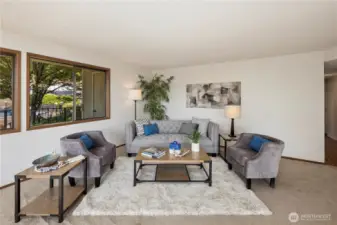 Living room with views of the pool.