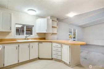 Plenty of countertop space for meal prep—and a stylish peninsula that connects seamlessly to the living area, perfect for casual dining or entertaining.