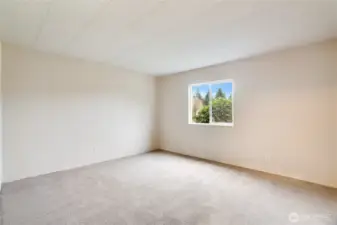 The third bedroom adds flexibility as a guest room, office, or hobby space.