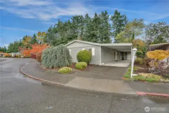 To the right, you’ll find the covered carport.