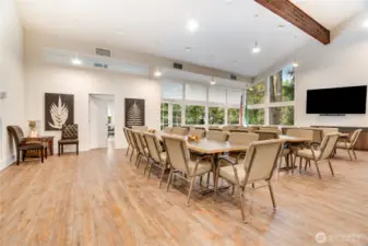 A spacious conference room hosts gatherings, meetings, and community events.