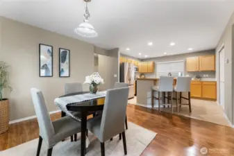 Kitchen looks out to dining room