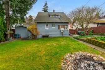Great shot of the back yard fire pit.  The shed is 10x12 and provides space for tools or toys.  The exterior of the home is in excellent condition as is the rest of the house.