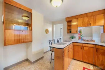 Built in hutch to display your finest.  Ample cupboard space to keep kitchen appliances, cookware and flatware and consumables.