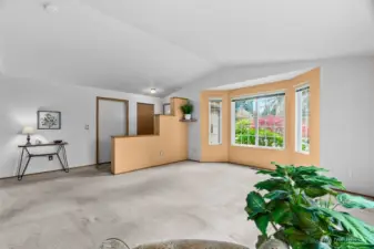 Another view of living room and entry