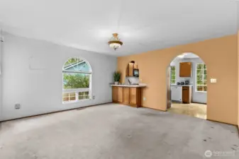 Dining room with small counter and storage and pass through to kitchen.  Great for entertaining.