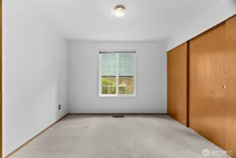 Second bedroom with huge 3 door closet.