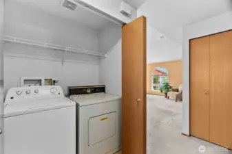 Washer and dryer in hall closet, included in sale.