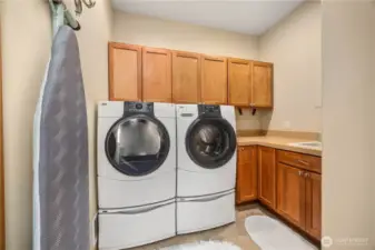Laundry with sink.