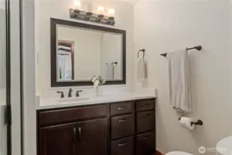 Ensuite bath with shower.