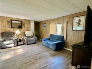 The entire home has newer laminate flooring