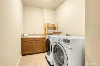 Large Laundry room with sink conveniently located on the Upper floor