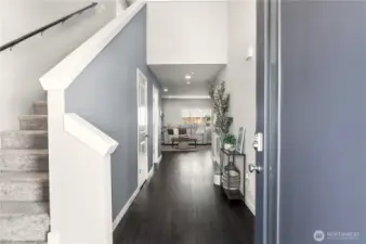 Wide Entry hallway and engineered vinyl flooring