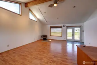 Currently an office, but could be a media room, family room extra gathering place. Complete with a pellet stove and access to the ocean front deck