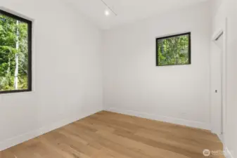 Primary Bedroom walk in closet.