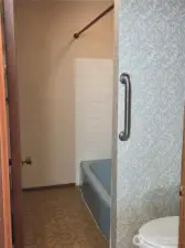 Primary Bathroom (sink, tub, shower, toilet)