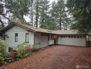 Just another view of the front of the house and garage.