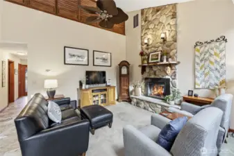 Looking back down the entry hall on the left, note the louvers up that separate the primary bedroom space from the living space below.