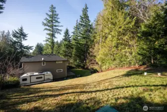 Space for RV parking with electrical hookup.