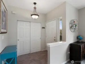 A large entry closet provides tons of storage.