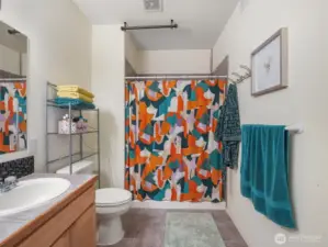 Elegant primary bath has a beautiful walk in shower.