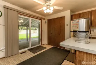 Kitchen with sliding glass door.