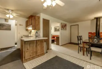 Kitchen with large pantry off the family room.