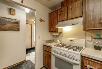 Kitchen with gas cooking.