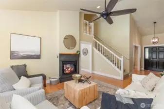 Gather and relax in this spacious great room with soaring ceilings and a seamless layout ideal for everyday living.
