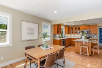 Open-concept living at its best connect with guests from kitchen to dining with ease and elegance.