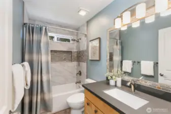 Crisp and bright upstairs full bath.