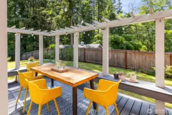 Dine al fresco or gather with friends on this sunny deck, complete with built-in seating and PNW views.