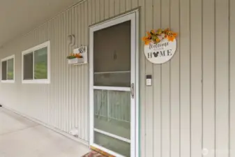 Exterior entrance into this top floor unit.