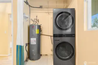Washer/dryer in closet of second bedroom.