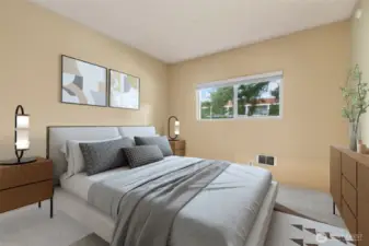 Primary bedroom is big enough for a king sized bed. (virtually staged)