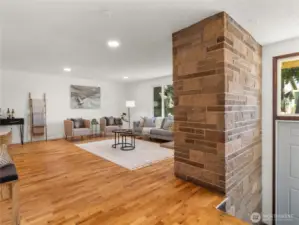 Mid century modern wood burning fireplace and original hardwood floors