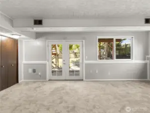 downstairs flex space. closet on left is an impressive mechanical closet with hot water heater/hvac