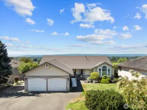 3 car tandem garage and RV parking.