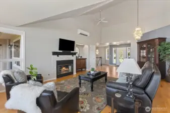 Vaulted ceilings and a cozy gas fireplace.