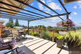 Pergola covered wrap around deck to capture the beautiful views!