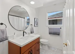 Main floor guest bath with new vanity/sink.