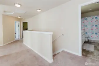 Upstairs stairwell and full bathroom