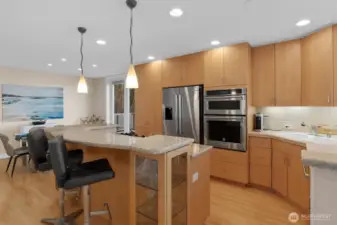 Entertain with ease as friends sip wine while you craft gourmet meals in this inspiring kitchen, set against sweeping views of the city and the Sound.