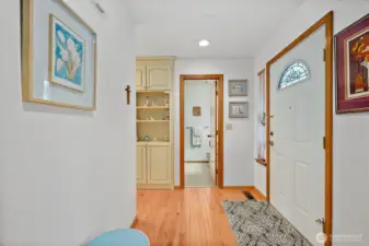 The view from the primary bedroom towards the hallway bathroom