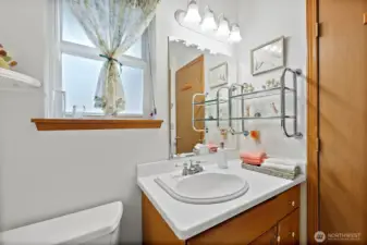 Spacious second bedroom with a full closet