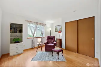 Spacious second bedroom with a full closet