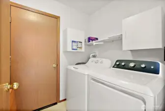 Laundry room and access door to garage