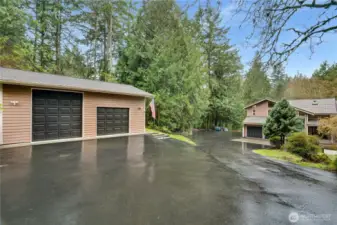 Bring the boat, trailer, and weekend projects—this property delivers a huge shop/RV bay, extra garage storage, and a long private drive that keeps everything tucked away from the street.