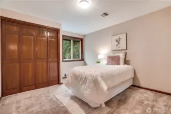 One of three additional upstairs bedrooms.