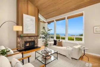 Warm and inviting living room space looking out to the lake view.